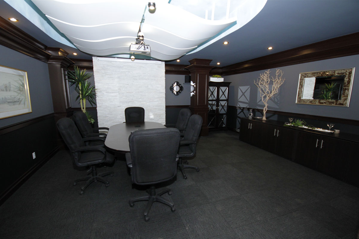 The board room is set up for meetings between Homeowners and Project Managers. It can also be utilized for teleconferences and web conferences.
