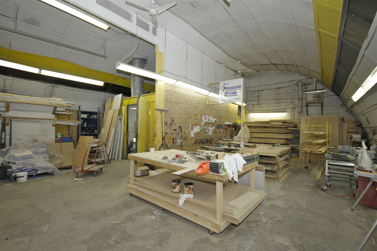 Full service carpentry shop with table-saw, miter saw, planer, shaper and drill press.