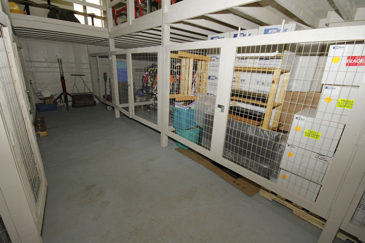Climate-controlled individual storage (secured) for processed contents that are ready to be returned upon job completion.
